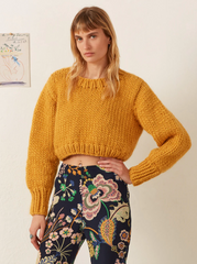 Person wearing Alix of Bohemia Ella Mango Knit Sweater